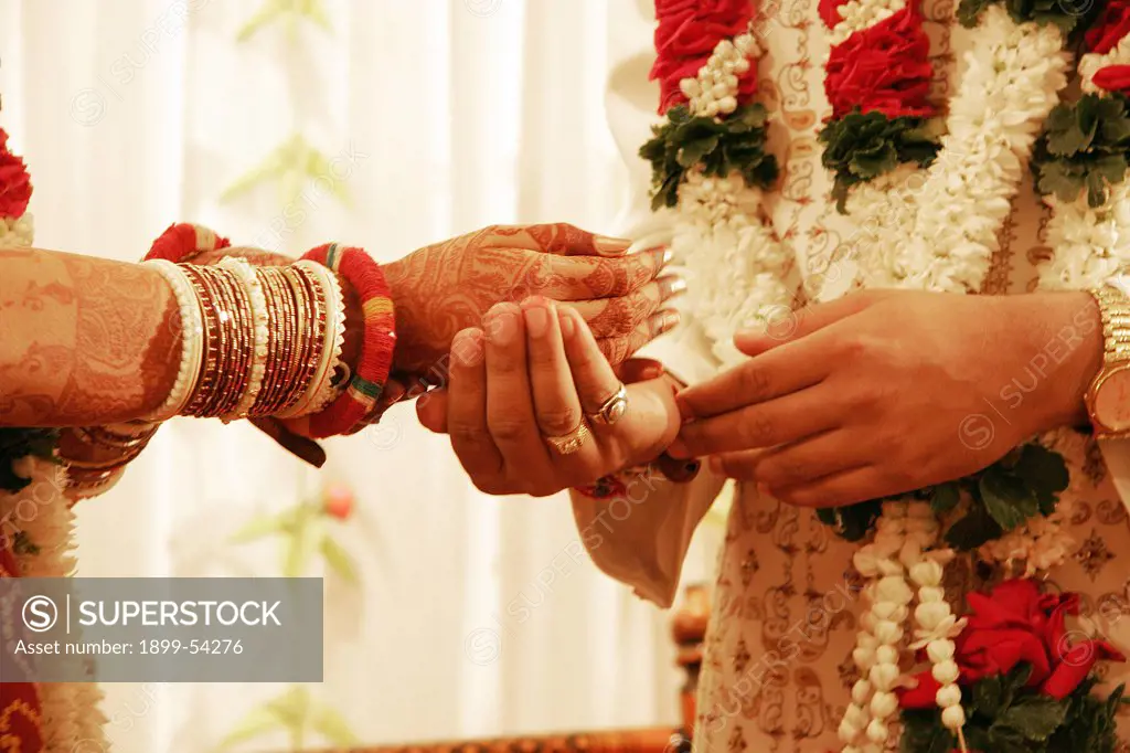 The Hands Of An Indian Gujarati Bride And Bridegroom On Their Wedding Day, India
