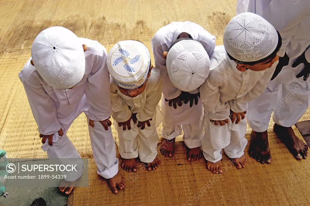 Mass Muslims Children Prayer Eid Ul Fitr Namaz, Ramzan Eid At Anjuman Islam School In Bombay Now Mumbai , Maharashtra, India