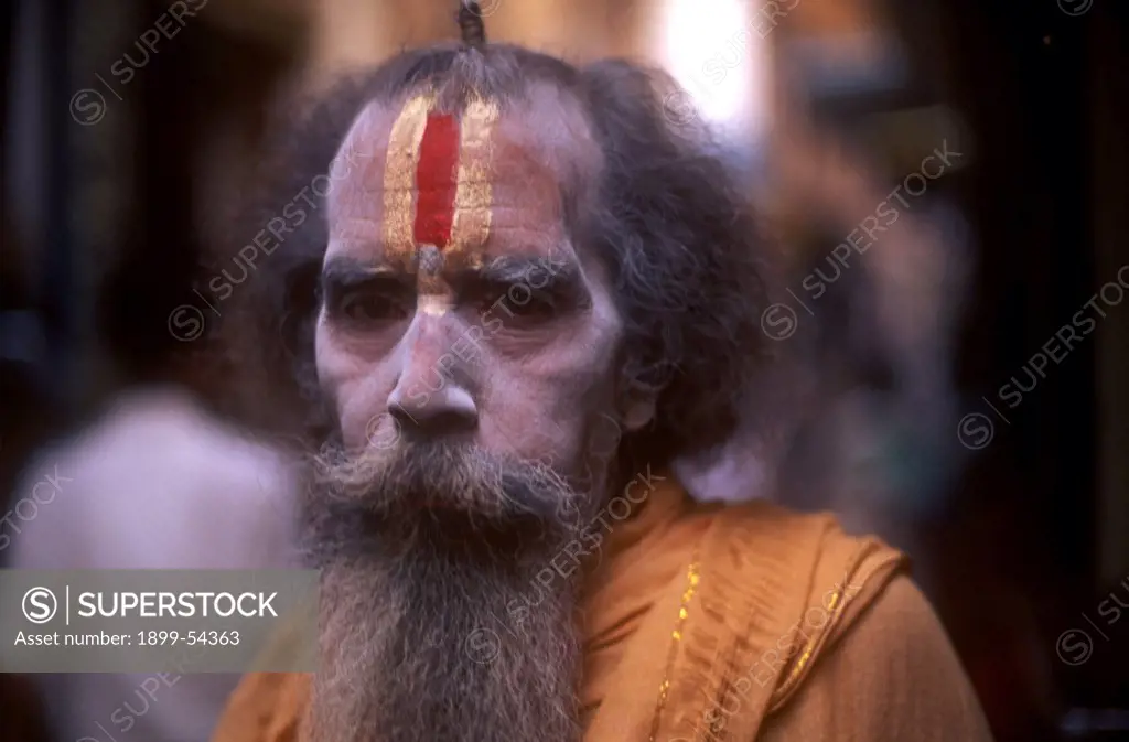 Indian Sadhu Priest With Red Tilak On Forehead Near The Holy River Ganges In The Oldest City Of India, Banaras, Now Varanasi, Uttar Pradesh, India.