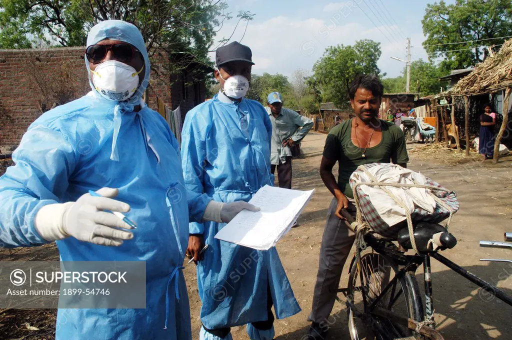 Villagers Hand Over Household Poultry To Government Health Workers For Culling Infected Chickens In The Backyard Of The Villager'S Houses At Hingona Village In Jalgaon District As Bird Flu Is Detected In Maharashtra, India
