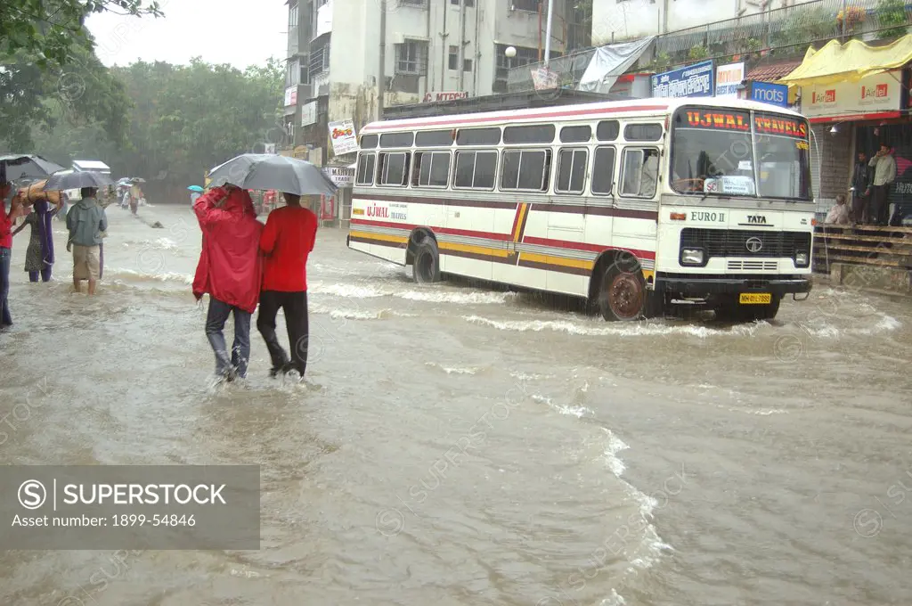 People And Bus In Heavy Rain At Bombay Mumbai, Maharashtra, India