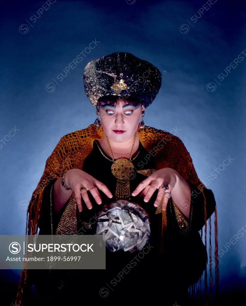 Fortune Teller Looking Into Crystal Ball, Filled With Money