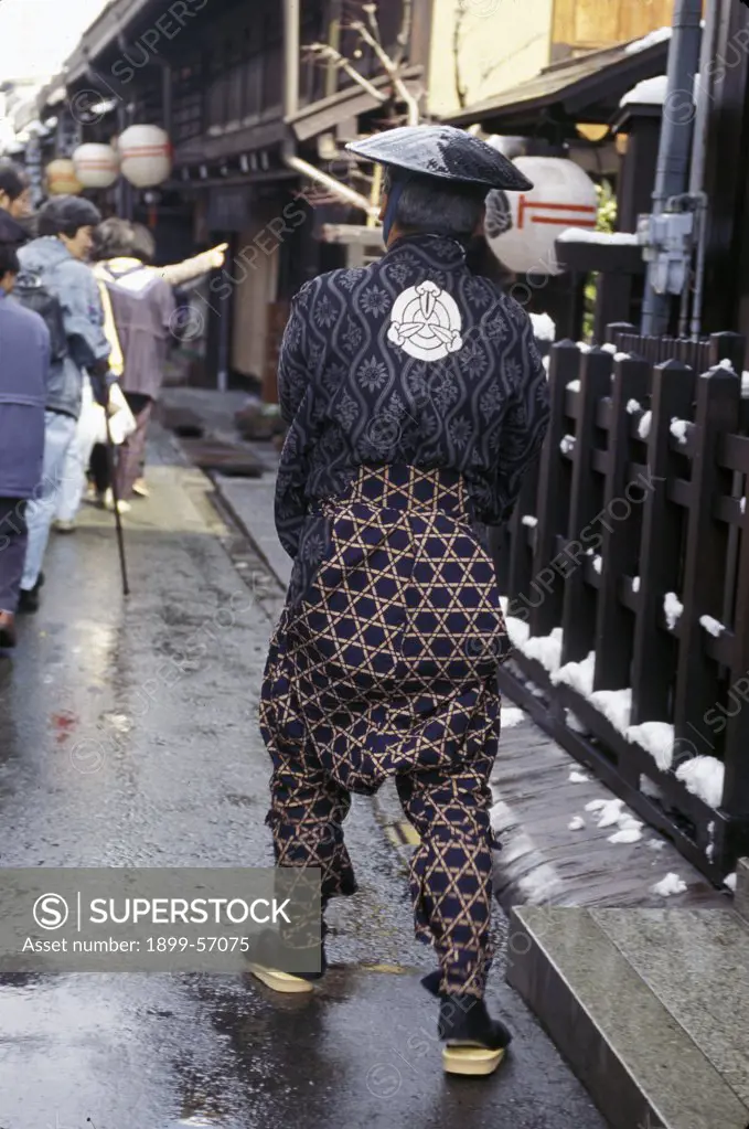 Japan, Takayama. Back Of Man In Traditional Festival Dress