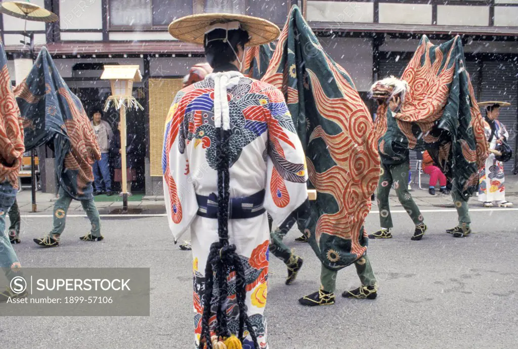 Japan, Takayama. Men Dressed As Lions In Procession At Festival.