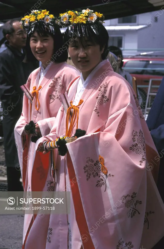 Japan, Takayama. Girls In Traditional Dress At Festival.