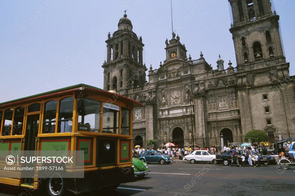 Mexico, Mexico City.Centro Historico Street. Car And Exterior Of Cathedral Zocalo.