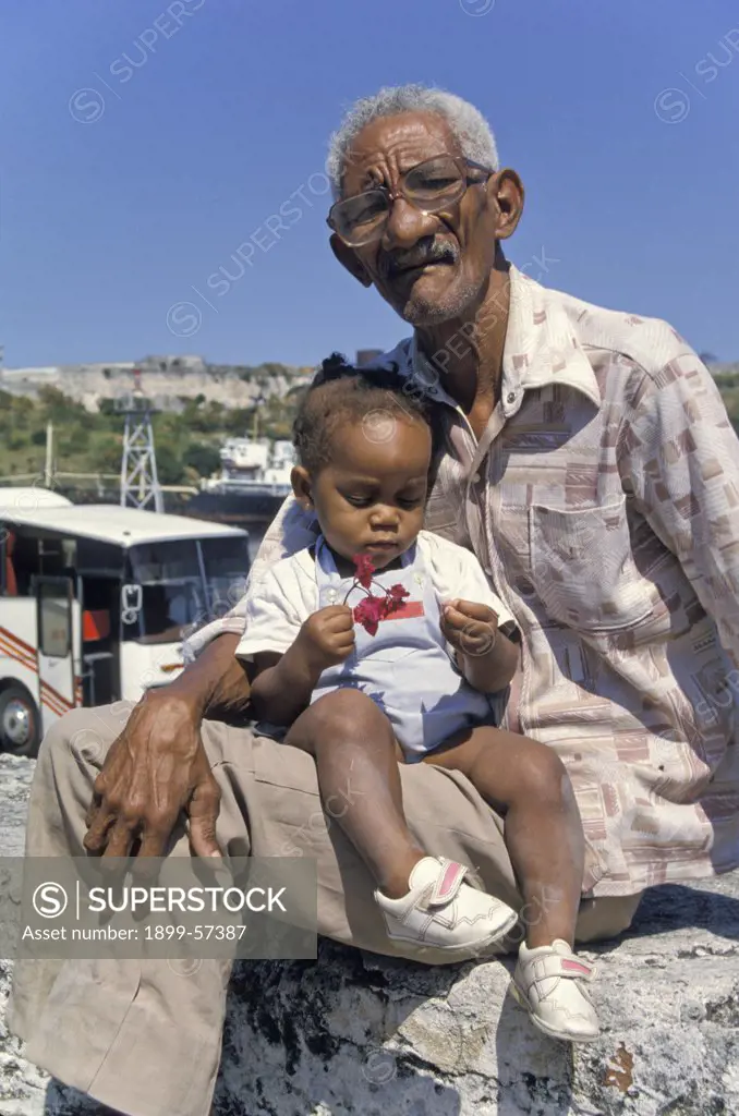 Cuba. Havana. Grandfather And Child.