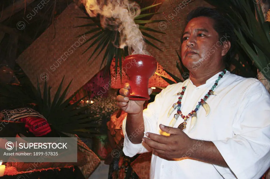 Shaman At Altar For Day Of The Dead Festivities At Xcaret Near Playa Del Carmen. Mexico