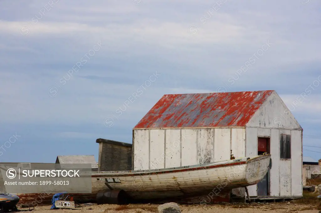 Boat And Fish-Drying Shed In Inuit Community Of Gjoa Haven, Nunavut, Northwest Passage, Arctic Canada