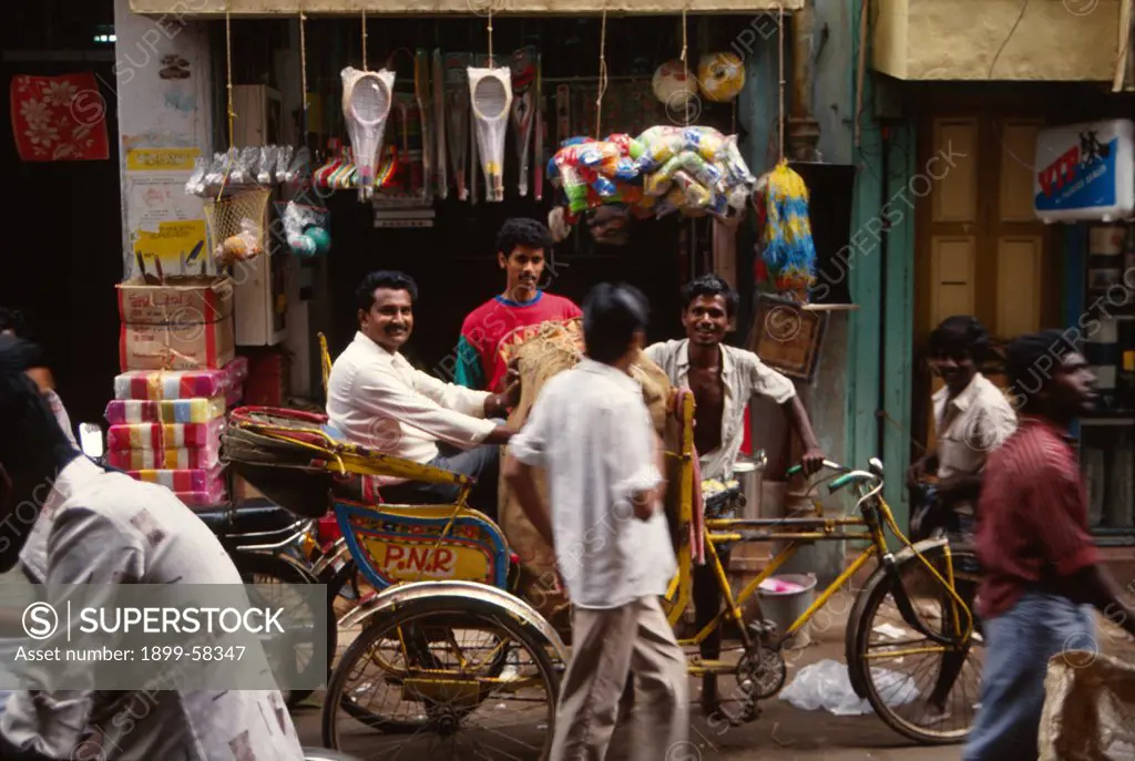 India. Street Scene. Men With Bicycle Rickshaw.
