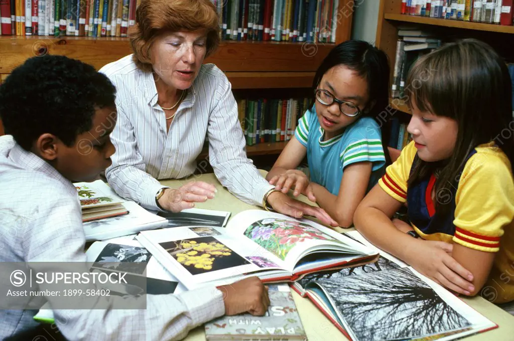 Teacher Working With Students.