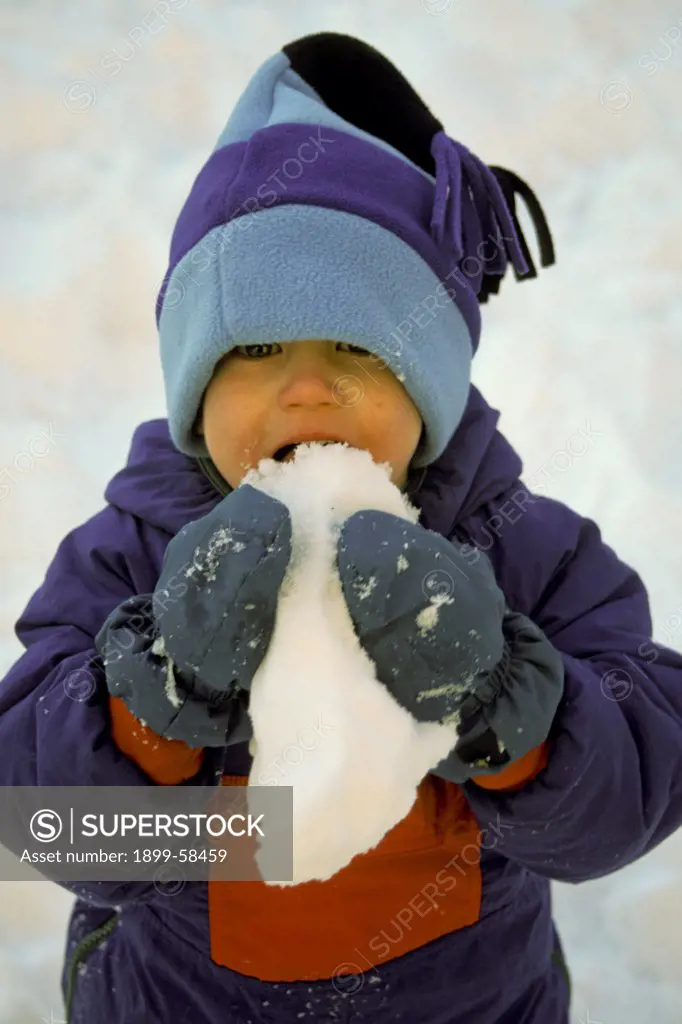 Four-Year-Old Child With Snow.
