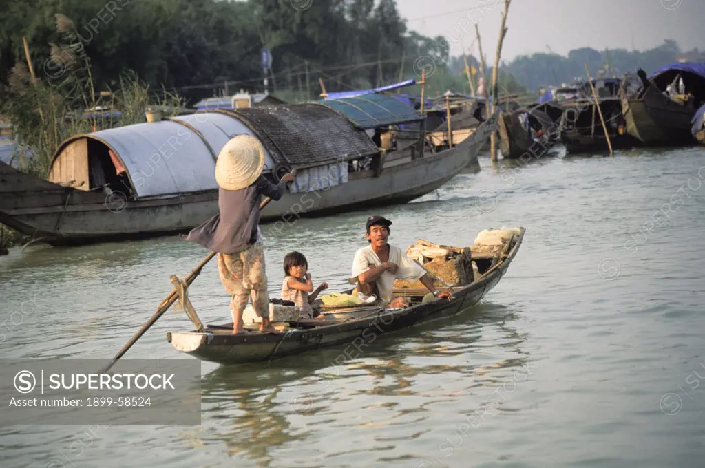 Vietnam. Hue. Perfume River. Family On Boat
