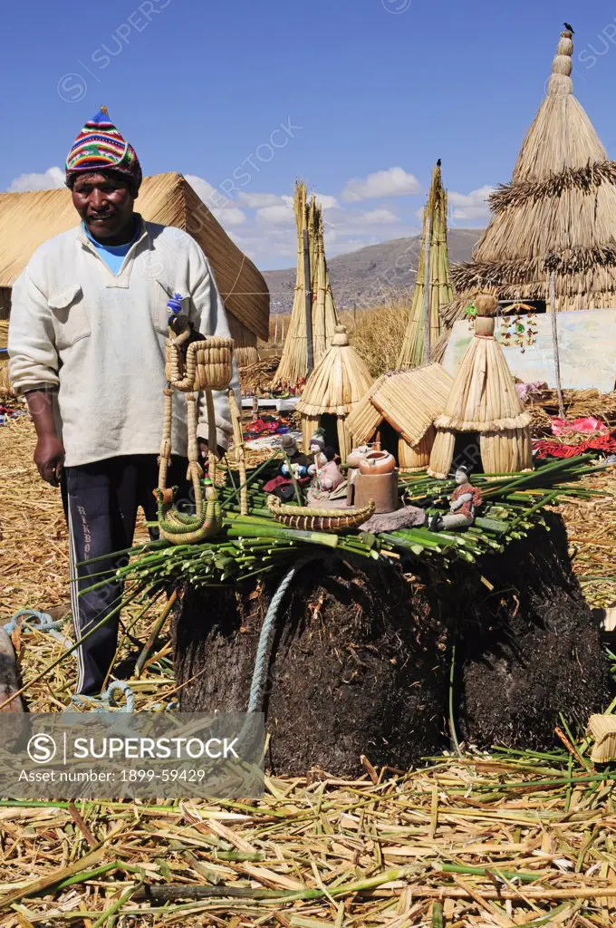 Uros Man With Moel Village, Lake Titicaca, Peru