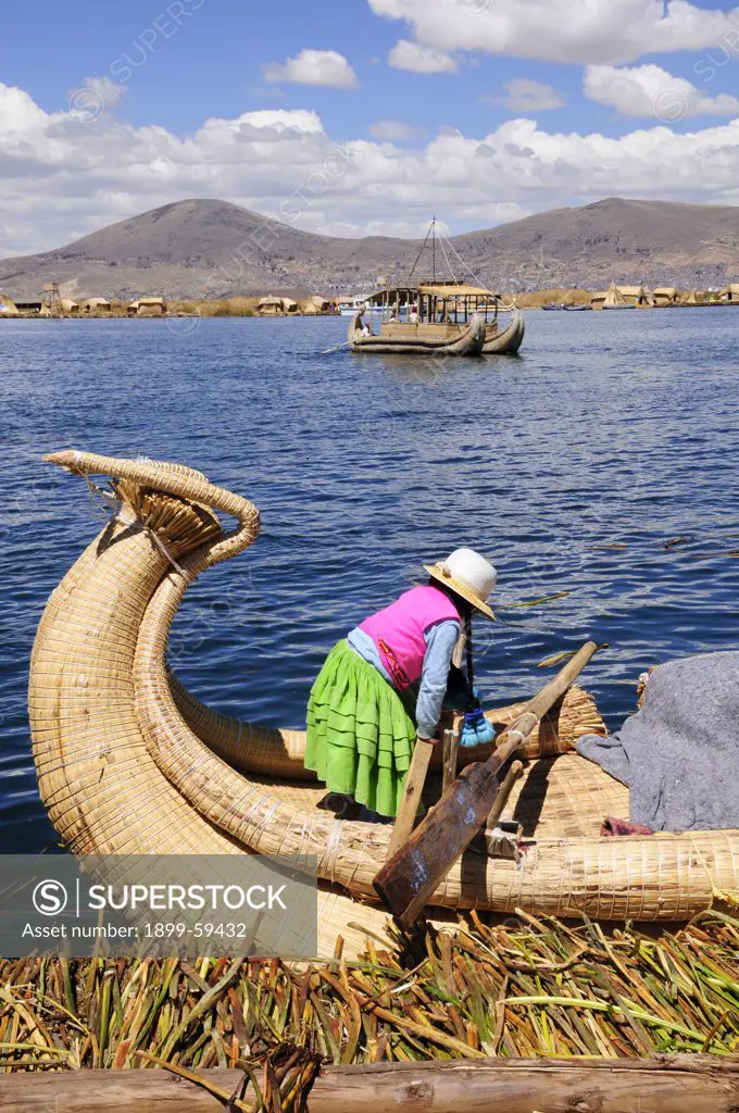 Uros Girl On Reed Boat, Lake Titicaca, Peru