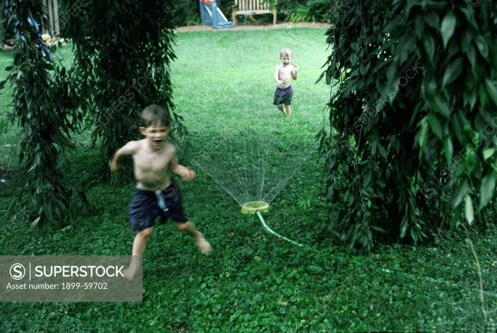 Washington, Dc, Kids Running Through Sprinkler