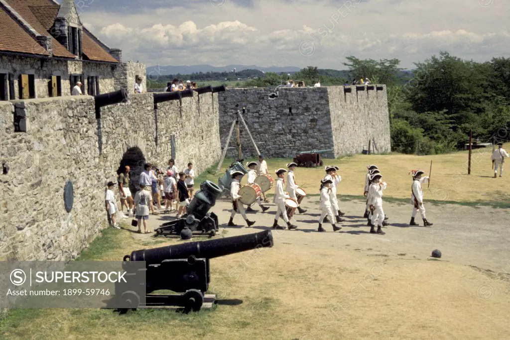 New York, Ft. Ticonderoga, Parade Of Children Exiting Fort, Dressed Colonial, Marching Band, Cannon Outside
