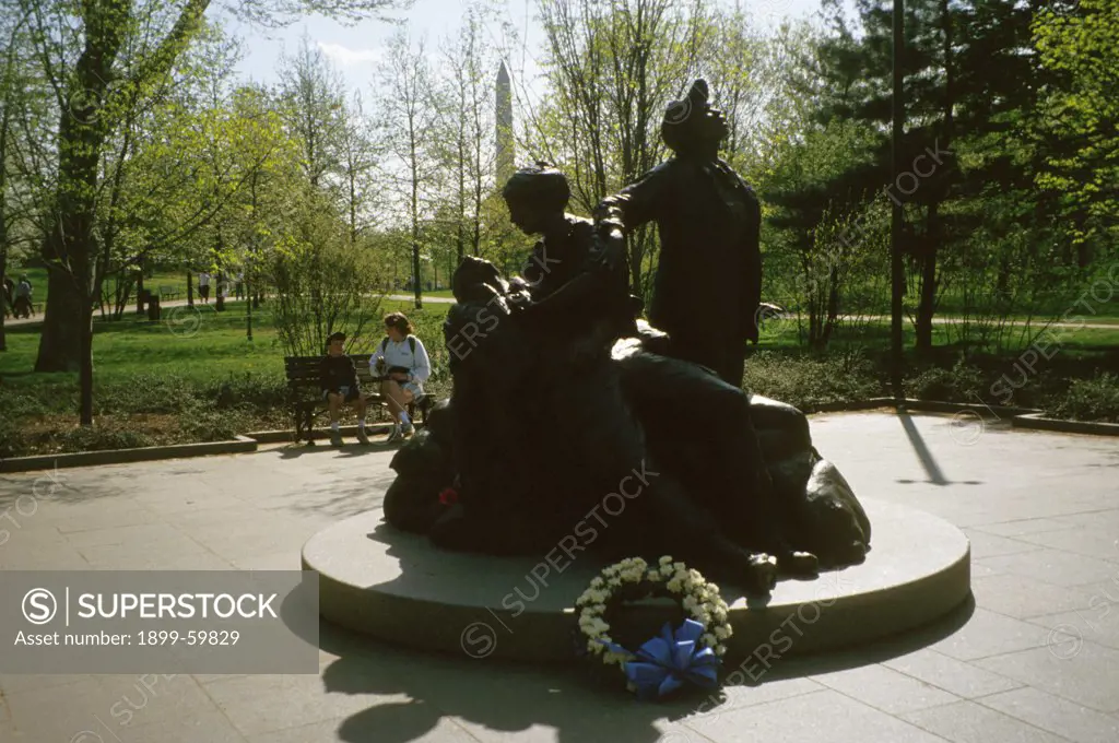 Washington, D.C. Vietnam VeteranS Memorial. Woman And Red Rose.