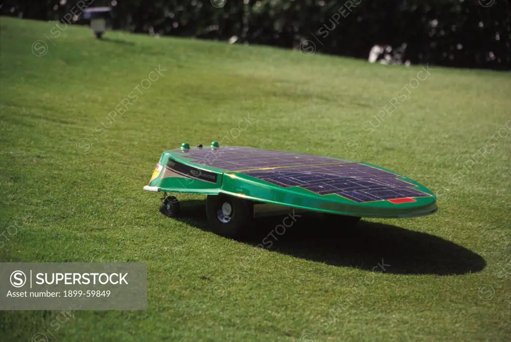 Florida, Orlando. Robotic Solar Powered Lawn Mower In Action.