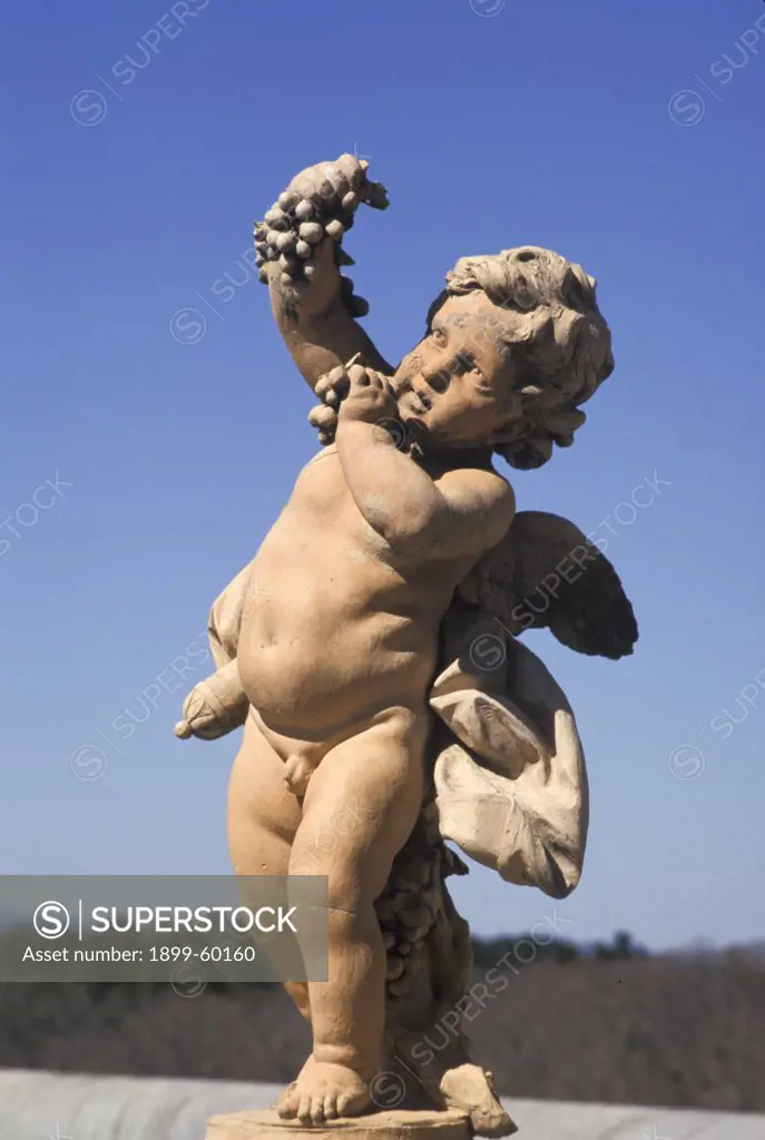 North Carolina, Asheville. Cupid Statue At Biltmore Estate.