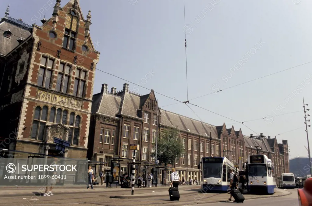 Netherlands. Amsterdam. Centraal Station Detail. Trams. Bus.