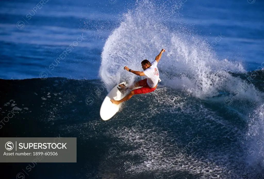 Hawaii, Oahu. Man Surfing At Rocky Point