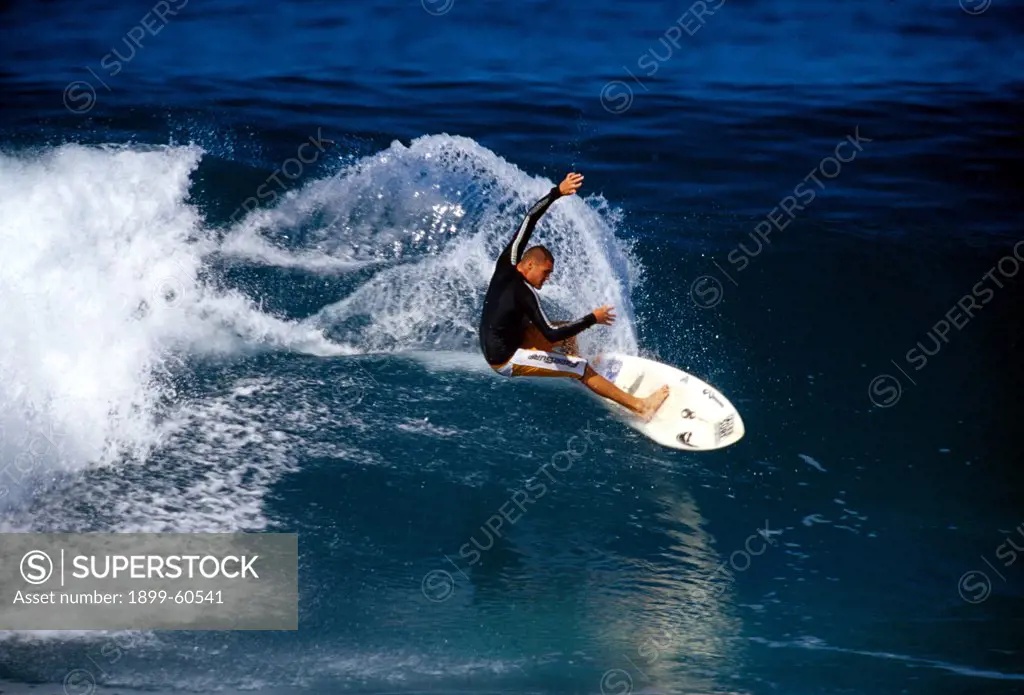 Hawaii, Oahu. Katy Greens. Man Surfing