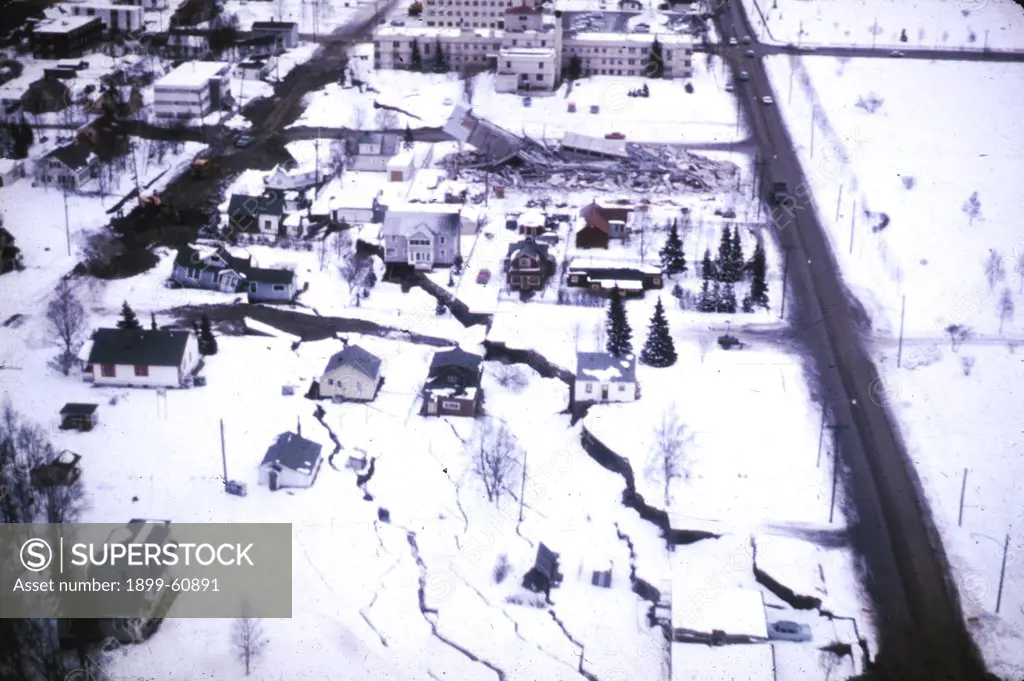 Alaska Earthquake March 27, 1964. A Subsidence Trough (Or Graben) Formed At The Head Of The L Street Landslide In Anchorage During The Earthquake. The Slide Block, Which Is Virtually Unbroken Ground To The Left Of The Graben, Moved To The Left. The Subsid