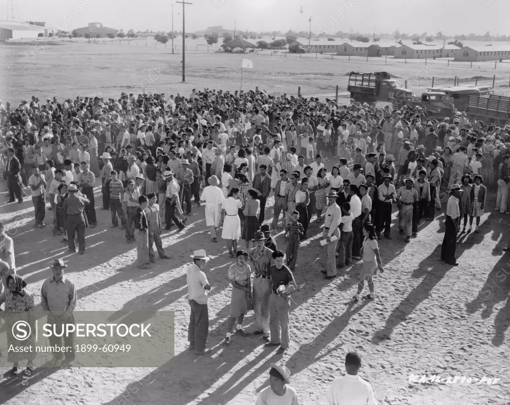Pinedale, California. Assembly Center. Grouping Of Evacuees Toward The Rim Of The Center Prior To Departing For Relocation Center. 1942