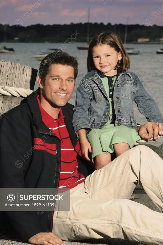 Father And Daughter At Marina