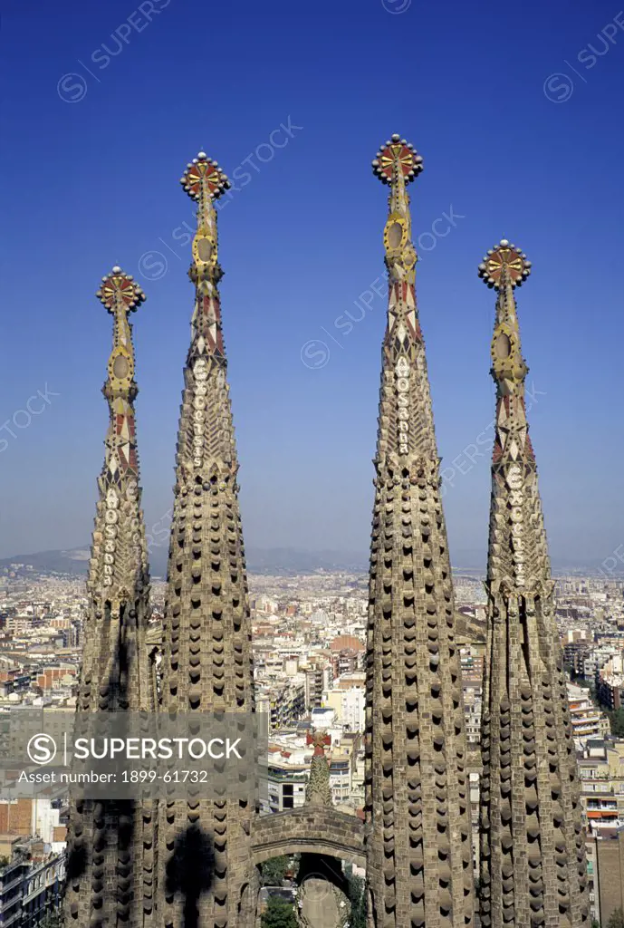 Spain, Barcelona. Spires Of Sagrada Familia Cathedral (Designed By Gaudi).