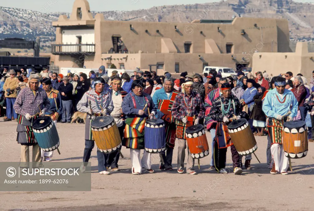 New Mexico. San Ildefonso. Drummers Dancing The Pueblo Comanche Dance