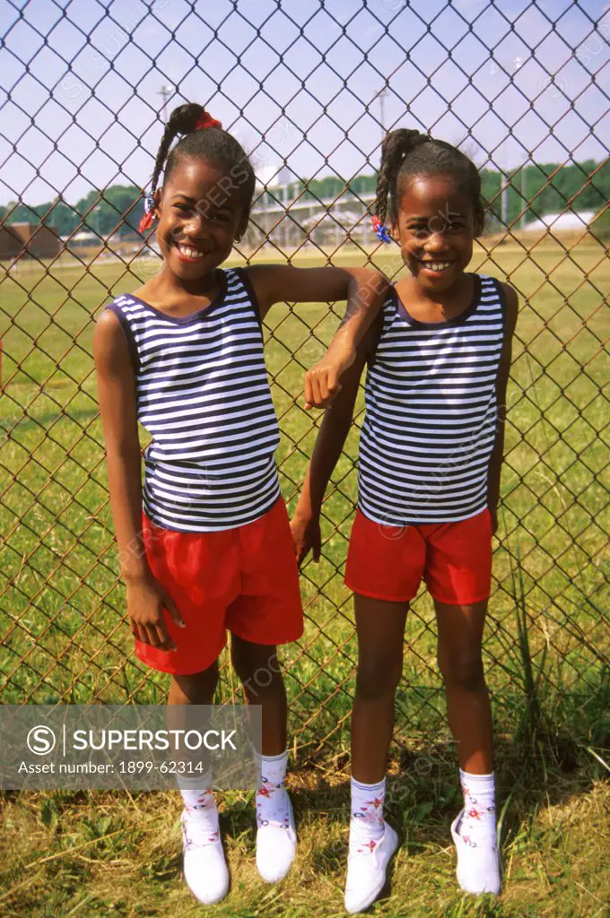 Twins, Around Ten Years Old, Pose In Matching Shirts And Shorts
