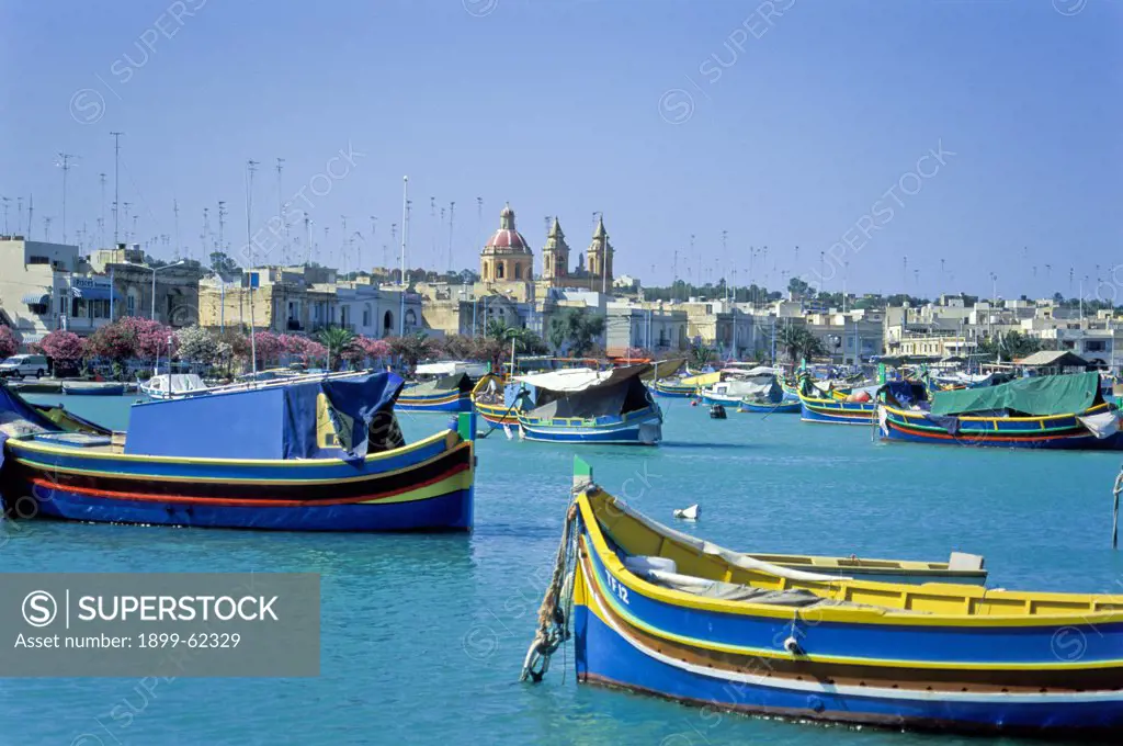 Malta. Colorful Boats In Harbor.