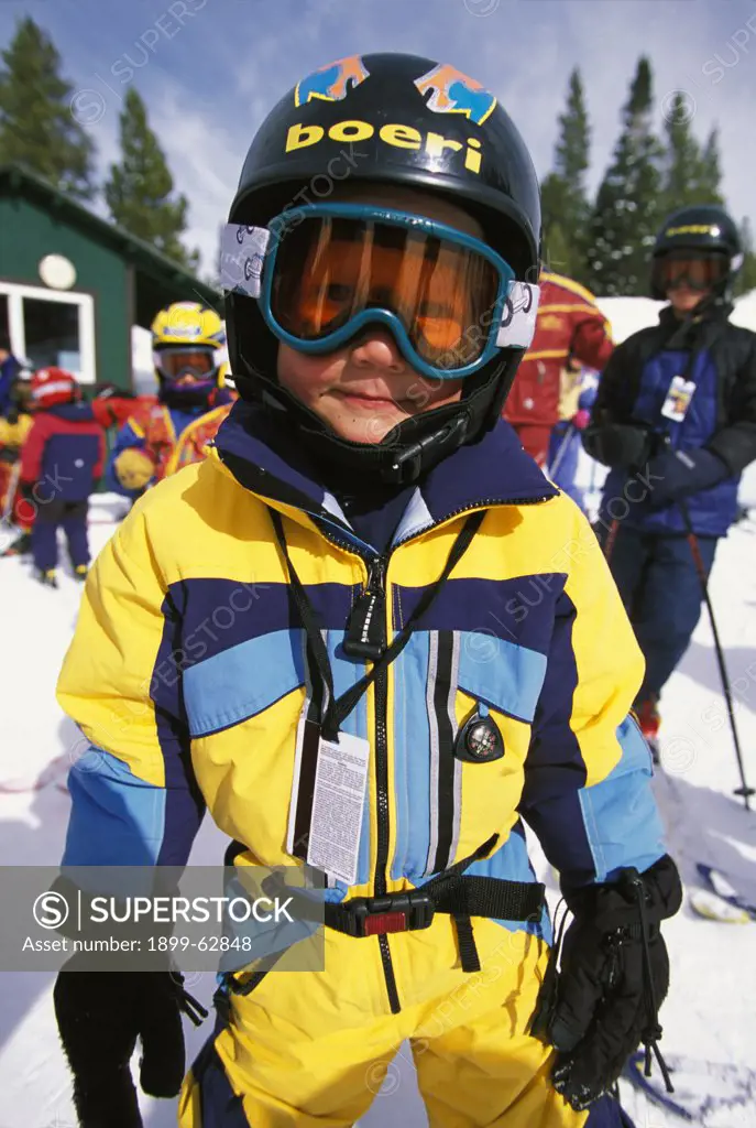 Colorado, Crested Butte. Boy Dressed To Go Skiing.
