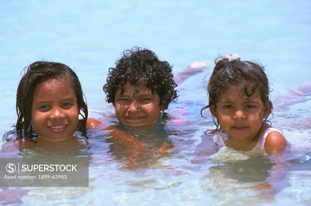Honduras, Central America, Bay Islands, Roatan, West Bay, Girls In The Water