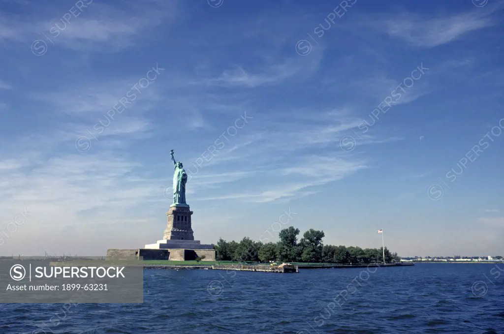 New York. Statue Of Liberty And Liberty Island, Seen From The Water