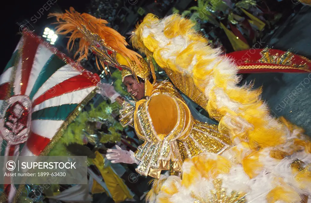 Brazil, Rio De Janeiro. Carnival, Grande Rio. Woman In Gold Costume