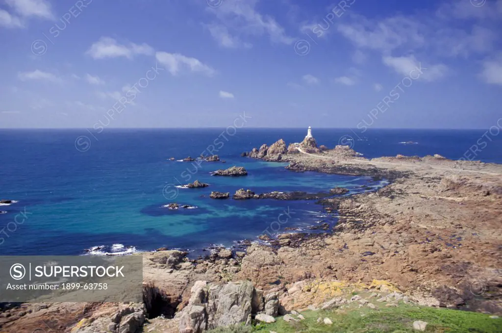 United Kingdom, Channel Islands, Jersey. La Corbiere Point, La Corbiere Lighthouse.