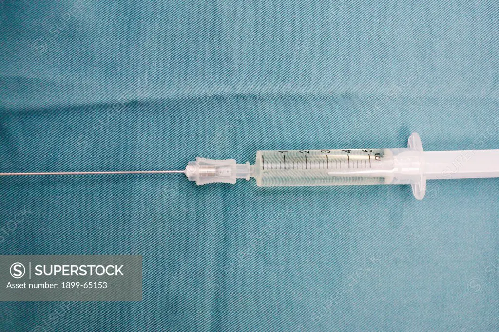 Disposable syringe containing sclerotherapy agent