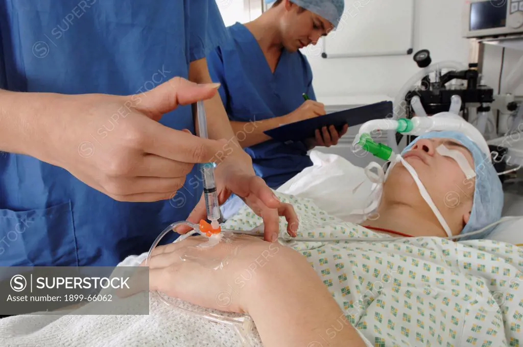 Anesthetist administering mixture of medical gasses