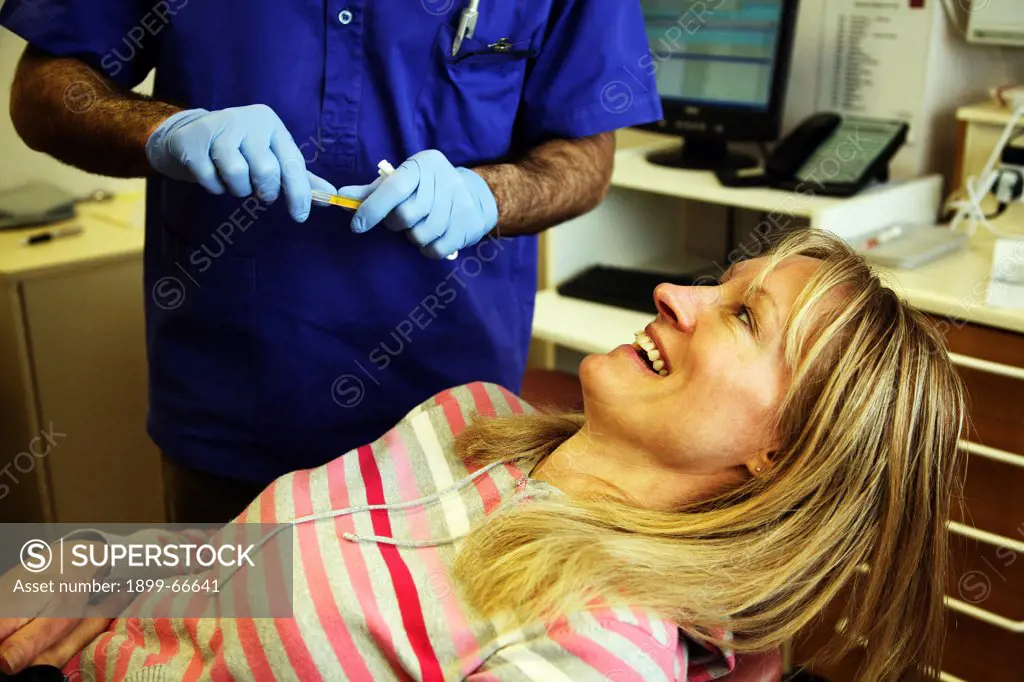 Female patient undergoing non-invasive procedure detecting
