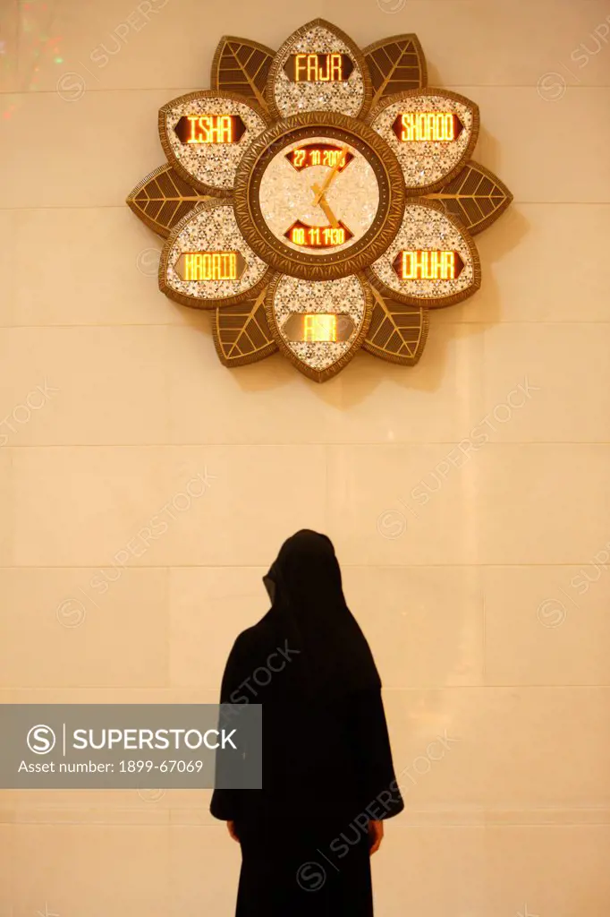 Sheikh Zayed Grand Mosque. Clocks indicating prayer times