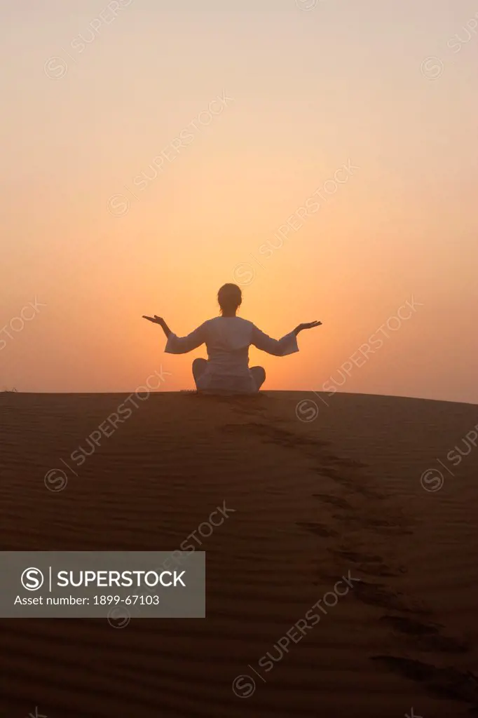 Sunset meditation in the desert