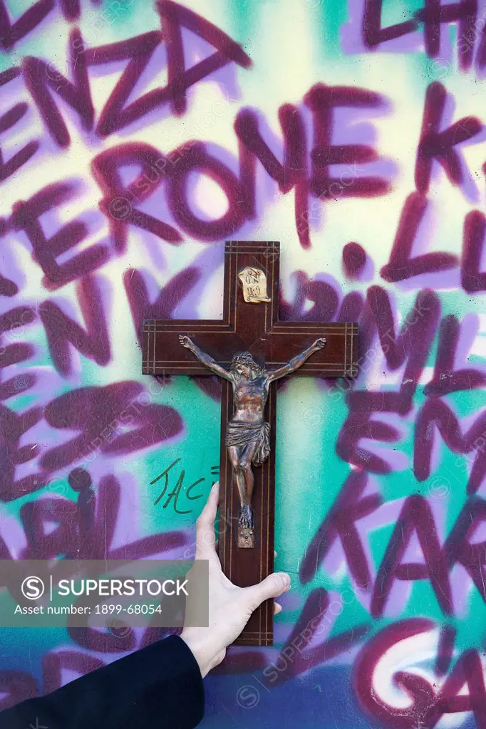 Cross and graffiti
