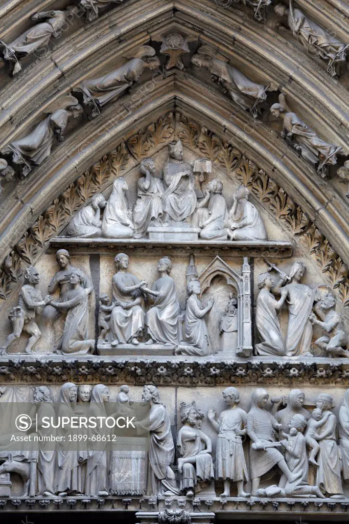 Notre Dame Cathedral. North facade. Cloister gate tympanum