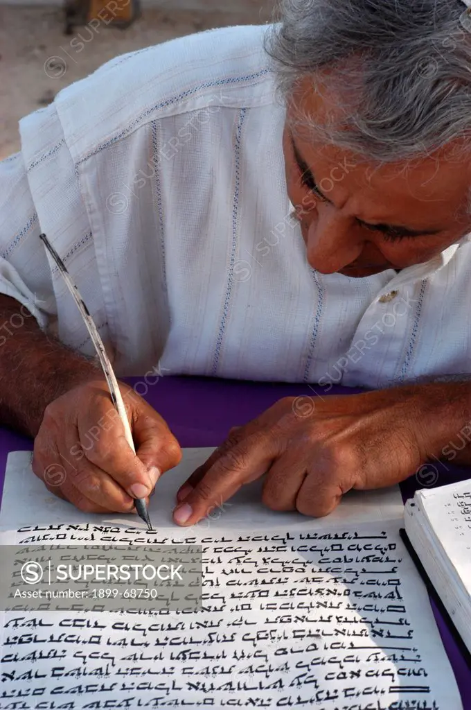 Torah scribe copying the Torah