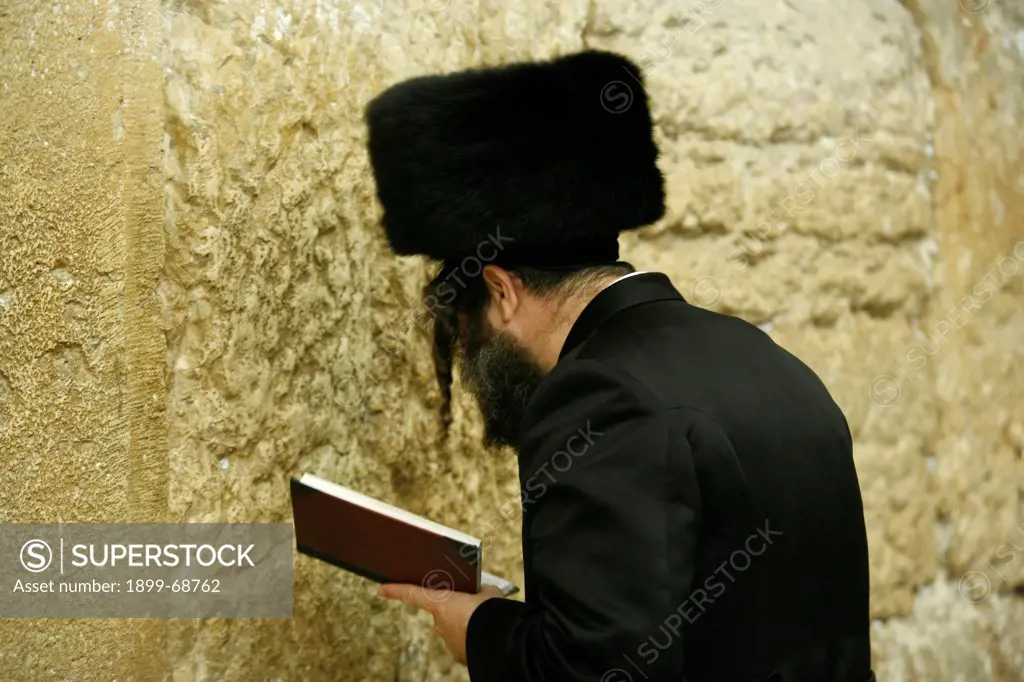 An Orthodox Jew prays at the Western Wall.