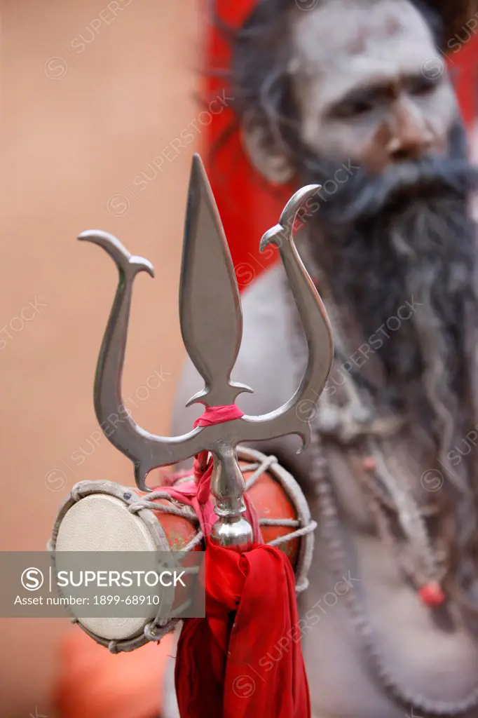 Sadhu with Shiva trident attending Haridwar Kumbh Mela