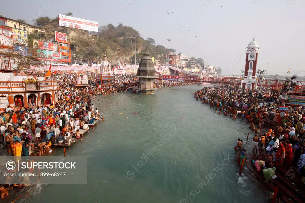 Thousands of devotees converge in Haridwar to take a dip in the river Ganges on the occasion of 'Navsamvatsar', a Hindu holiday taking place during the Maha Kumbh Mela festival